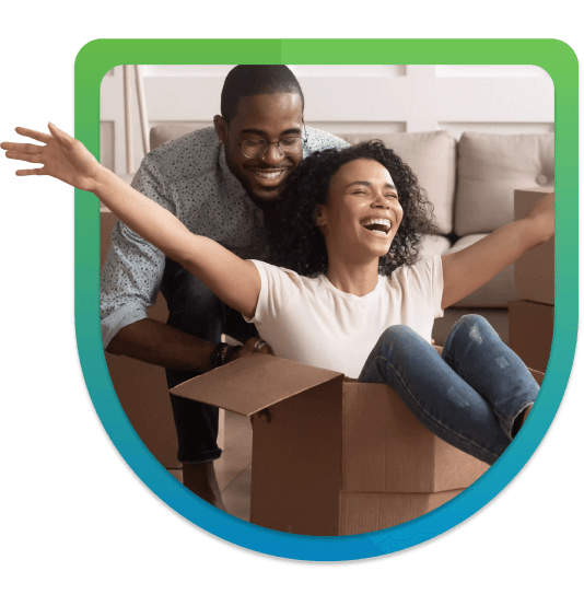 Man pushing woman in cardboard box 