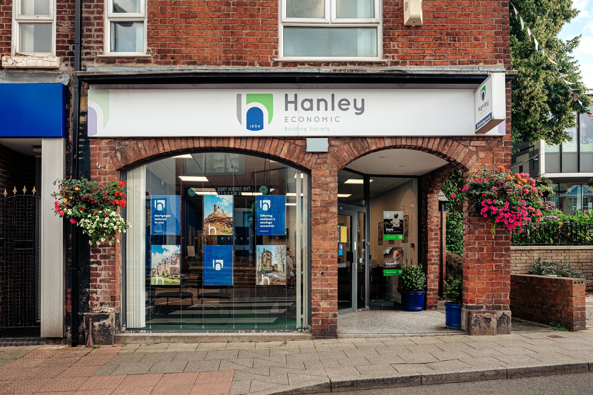 Consumer Guardian badge Customer satisfaction badge Infront of Hanley branch