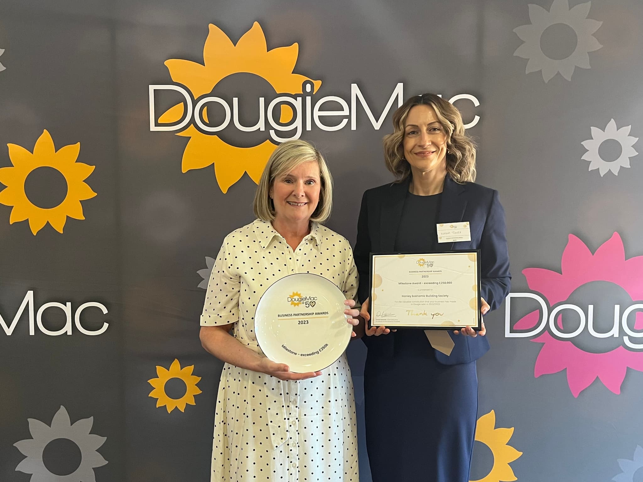 Image of Sue Pedley & Nicola Towey accepting their Dougie Mac Awards